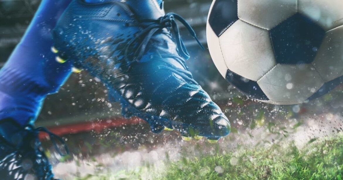 Football boot and ball close up